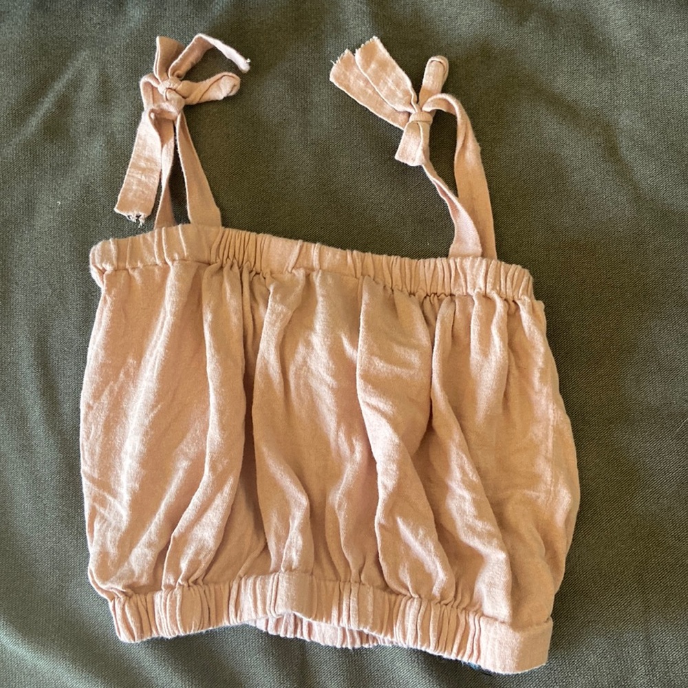 Very cute light pink crop top for teens and young adults.